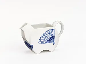 <b class=qtipBold><figcaption>'Variety' milk jug</figcaption></b><br>Glazed porcelain milk jug decorated with the 'Variety' pattern, a transfer-printed blue design including geometric motifs, fans and bamboo, part of a tea set manufactured by Royal Worcester in 1876. Date: 1876<br><em>© The Geffrye Museum of the Home / Mary Evans Picture Library</em> 'Variety' milk jug