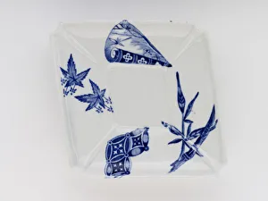 <b class=qtipBold><figcaption>'Variety' saucer</figcaption></b><br>Glazed porcelain saucer decorated with the 'Variety' pattern, a transfer-printed blue design including geometric motifs, fans and bamboo, part of a tea set manufactured by Royal Worcester in 1876. Date: 1876<br><em>© The Geffrye Museum of the Home / Mary Evans Picture Library</em> 'Variety' saucer