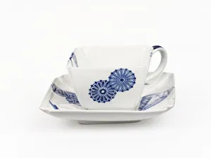 <b class=qtipBold><figcaption>'Variety' tea cup and saucer</figcaption></b><br>Glazed porcelain tea cup decorated with the 'Variety' pattern, a transfer-printed blue design including geometric motifs, fans and bamboo, part of a tea set manufactured by Royal Worcester in 1876. Date: 1876<br><em>© The Geffrye Museum of the Home / Mary Evans Picture Library</em> 'Variety' tea cup and saucer