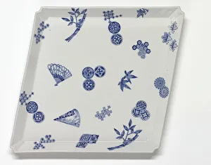 <b class=qtipBold><figcaption>'Variety' tray</figcaption></b><br>Glazed porcelain diamond-shaped tray decorated with the 'Variety' pattern, a transfer-printed blue design including geometric motifs, fans and bamboo, part of a tea set manufactured by Royal Worcester in 1876. Date: 1876<br><em>© The Geffrye Museum of the Home / Mary Evans Picture Library</em> 'Variety' tray
