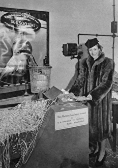 Vera Lynn shredding her fan mail for the war effort Vera Lynn shredding her fan mail for the war effort