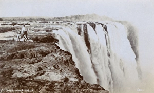 Victoria Main Falls and tourists, Rhodesia (Zimbabwe) Victoria Main Falls and tourists, Rhodesia (Zimbabwe)