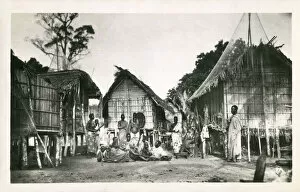 Poles Gallery: Village Scene - Ivory Coast - 1940s