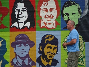 Wall mural close up of colourful images of people at Belfast Wall mural close up of colourful images of people at Belfast