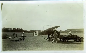 Humber Vintage Car towing a Humber-built Monoplane Print, 1910