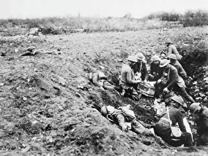 <b class=qtipBold><figcaption>Western Front, France, 1918</figcaption></b><br>Telephone and pigeon men in a shell hole. Telephone lines are broken so messages have to be sent by carrier pigeons on the Western Front in France during World War I on 25th April 1918.<br><em>© Mary Evans/Robert Hunt Collection/Imperial War Museum</em> Western Front, France, 1918