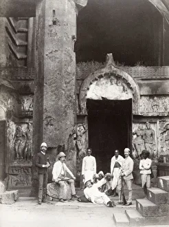 Westerners and native Indian men, temple,, India Westerners and native Indian men, temple,, India