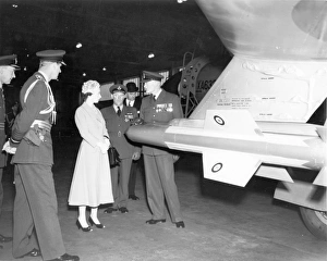 Wg Cdr R D Romanis gives Queen Elizabeth II a tour Wg Cdr R D Romanis gives Queen Elizabeth II a tour