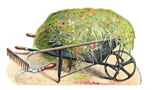 Wheelbarrow and tools on a cutout greetings card Wheelbarrow and tools on a cutout greetings card