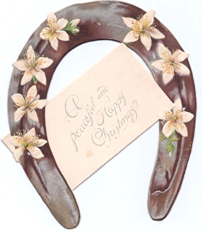 White flowers on a horseshoe-shaped Christmas card White flowers on a horseshoe-shaped Christmas card