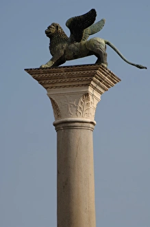 Winged lion statue of Saint Mark on a granite column in the Winged lion statue of Saint Mark on a granite column in the