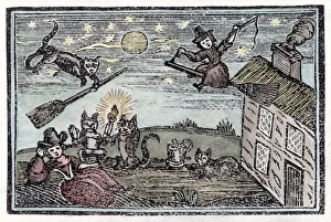 <b class=qtipBold><figcaption>Witches & Familiars</figcaption></b><br>Witches with their familiars, one of which has learnt to fly a broomstick on its own !<br><em>© Mary Evans Picture Library</em> Witches & Familiars