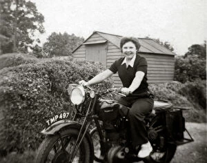 Motorcyclist Gallery: Woman on a 1938 Ariel motorcycle