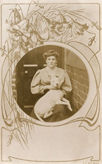 Woman with a bull terrier in a back yard Woman with a bull terrier in a back yard