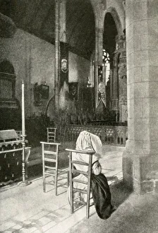 Woman in a Catholic church, Brittany, Northern France Woman in a Catholic church, Brittany, Northern France