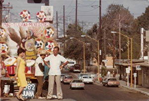Tijuana Gallery: Woman and two men standing on the float above the street