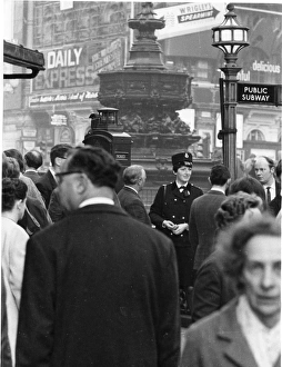 Woman police officer at Piccadilly Circus, London Woman police officer at Piccadilly Circus, London