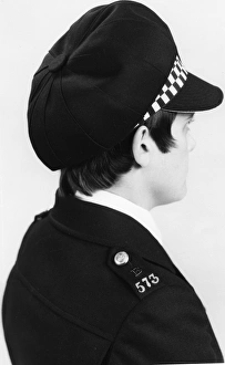 Woman police officer in updated hat, London Woman police officer in updated hat, London