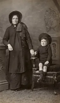 Woman in Salvation Army uniform and little boy Woman in Salvation Army uniform and little boy