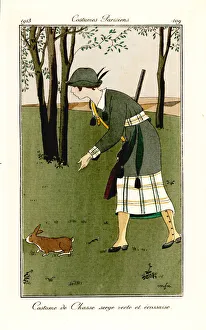Woman with shotgun in hunting outfit of green Woman with shotgun in hunting outfit of green