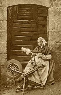 Spin Gallery: Woman at a spinning wheel, Dinan, Brittany, Northern France