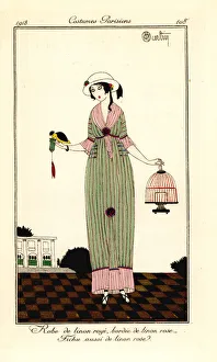 Woman in striped linen dress holding a bird and cage, 1913 Woman in striped linen dress holding a bird and cage, 1913
