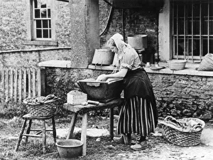 Woman on wash day in the country, 1890s Woman on wash day in the country, 1890s