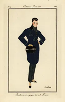 Woman wearing an overcoat in blue French vicuna wool Woman wearing an overcoat in blue French vicuna wool