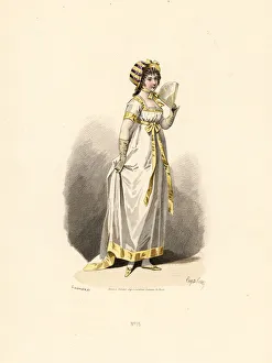 Woman in white dress with yellow trim with fan Woman in white dress with yellow trim with fan