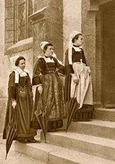 Women outside a Catholic church, Brittany, Northern France Women outside a Catholic church, Brittany, Northern France