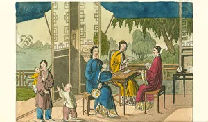 Women playing the card game Zi Pai in a pavilion in Women playing the card game Zi Pai in a pavilion in