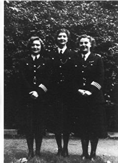 Three women police officers in a garden Three women police officers in a garden