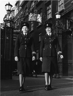 Two women police officers in a London street Two women police officers in a London street