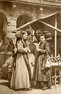 Women out shopping in traditional costume, Alsace, France Women out shopping in traditional costume, Alsace, France