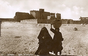 Women in front of the site of Palmyra, Syria Women in front of the site of Palmyra, Syria