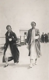 <b class=qtipBold><figcaption>Two women stroll along the seafront</figcaption></b><br>Two stylish women strolling along the seafront. The weather is likely a little breezy as long overcoats, scarves and berets on show... Date: circa 1920s<br><em>© Grenville Collins Postcard Collection / Tom Gillmor / Mary Evans</em> Two women stroll along the seafront