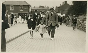 Working class gent with his two young daughters Working class gent with his two young daughters