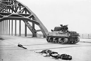Tracked Gallery: World War II - British tank crosses bridge Waal river