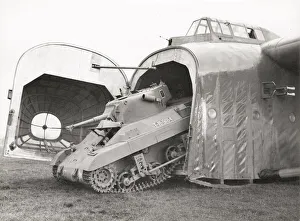 WW II - T-19 Locust tank emerging from a Hamilcar gilder WW II - T-19 Locust tank emerging from a Hamilcar gilder