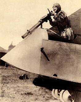 WW1 - Lady aviator air-gunner demonstration in aeroplane WW1 - Lady aviator air-gunner demonstration in aeroplane