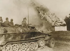 Relating Gallery: WW2 - German tank driving through a burning Russian village