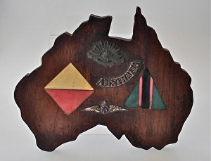 WWI mahogany plaque in the shape of Australia WWI mahogany plaque in the shape of Australia