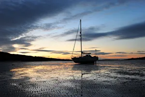 Yacht Moonshadow on beach at Carrick, Dumfries and Galloway Yacht Moonshadow on beach at Carrick, Dumfries and Galloway