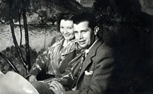 Young Couple sitting in an amusement ride car - Blackpool Young Couple sitting in an amusement ride car - Blackpool