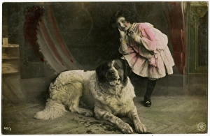 Young French girl with a huge St Bernard Dog Young French girl with a huge St Bernard Dog