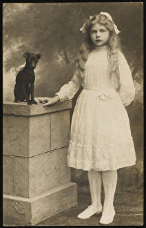 <b class=qtipBold><figcaption>Young Girl and Pet Dog</figcaption></b><br>A young girl dressed in her best white dress, with her pet dog, a Manchester Terrier.<br><em>© Mary Evans Picture Library 2015 - https://copyrighthub.org/s0/hub1/creation/maryevans/MaryEvansPictureID/10193422</em> Young Girl and Pet Dog