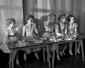 Young girls enjoying food at a party Young girls enjoying food at a party