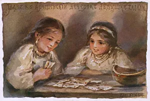 Two Young Jewish girls play cards - Christmas Eve - Russia Two Young Jewish girls play cards - Christmas Eve - Russia