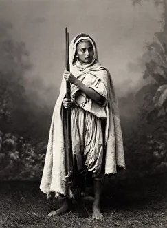 Young North African soldier with his gun Young North African soldier with his gun