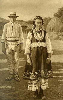 Young peasant girl in traditional gala dress, Bulgaria Young peasant girl in traditional gala dress, Bulgaria